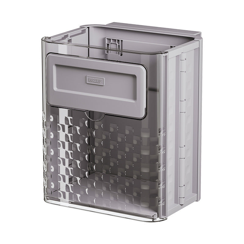 Foldable wall-mounted kitchen trash can for home use; made of plastic; installs with traceless adhesive.