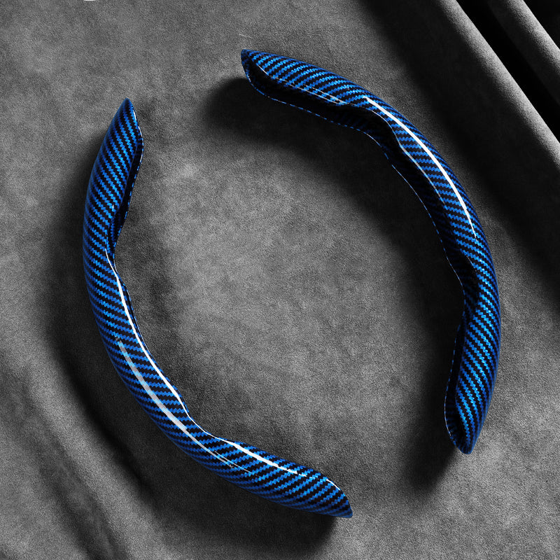 🎉 2026 Sale — Over 37600 Sold! 📢Universal Carbon Fiber Texture Steering Wheel Cover｜Ergonomic Anti-Slip Segmented Grip Protector ✨