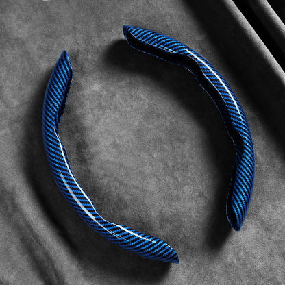 🎉 2026 Sale — Over 37600 Sold! 📢Universal Carbon Fiber Texture Steering Wheel Cover｜Ergonomic Anti-Slip Segmented Grip Protector ✨